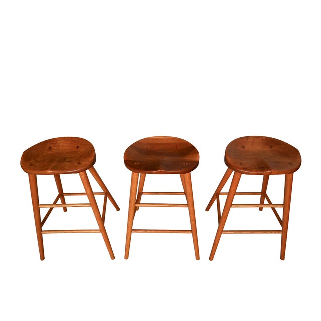 Thomas Moser Bar Stools with a Cherry Saddle Seat or Coal Shovel Signed Thom. Moser, Auburn, Maine 1979 Look at the...