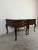 Beautiful pair of vintage Drexel nightstands featuring a warm finish, dovetailed drawers, brass bail pulls, scalloped...