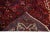 Beautiful Vintage Persian hand-knotted Wool rug with the red field. This Persian rug has a multicolor accents in all over...