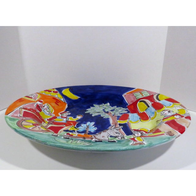 Oversize Italian hand-painted platter exclusively made for Macy's The Cellar, by De Simone. The 21.75" diameter platter is...