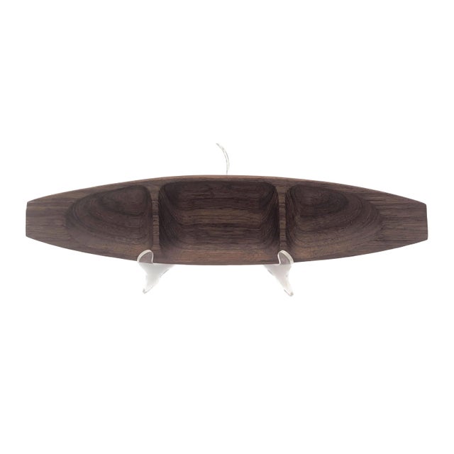 Offered is a vintage 1970s carved and lathed canoe-shaped Teak wood partitioned snack or condiment tray that can be used...