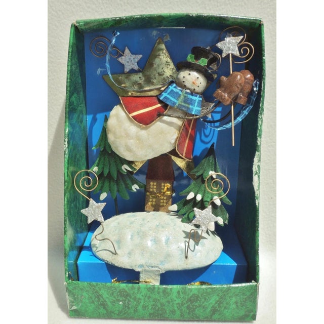Large decorative metal tin snowman Christmas stocking holder. New, old stock. Never used. No damage. SO Cute!!...