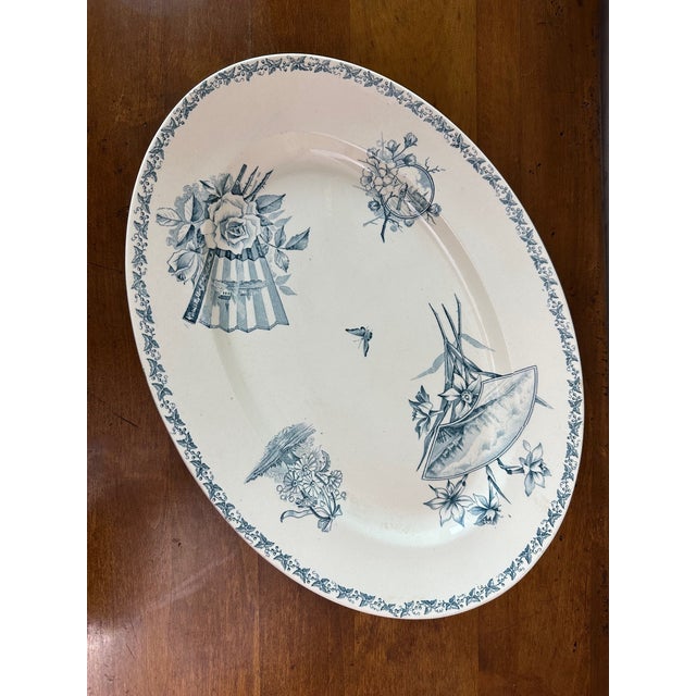 Very beautiful blue and white earthenware service dating from the beginning of the 20th century (1900) and signed by the...