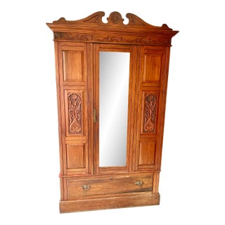 Early 1900s Antique Victorian Mahogany Carved Wood Armoire With Mirror For Sale