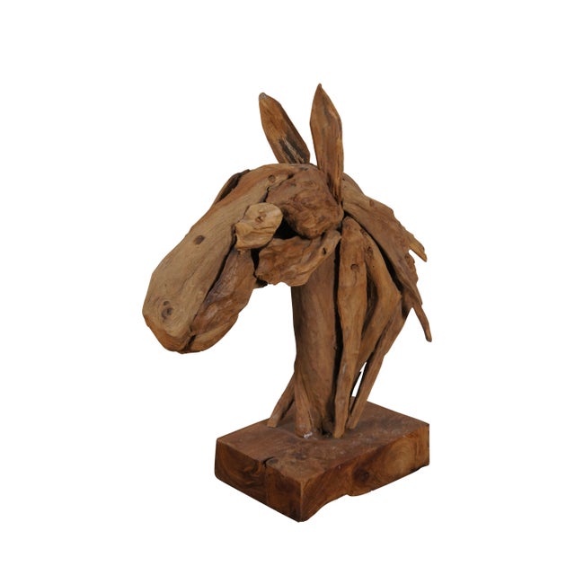 Vintage 20th century bust / sculptur depicting a semi-abstract horse's head crafted of pieces of driftwood, mounted on a...