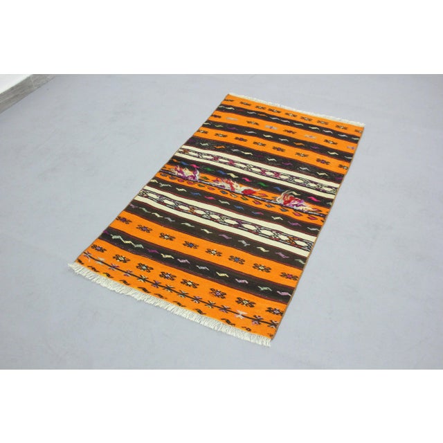 1970s Southwestern Handmade Wool Pumpkin Yellow Turkish Kilim Area Rug Size: 2.9 x 4.8 ft - 84 x 143 cm - 33 x 56 inches...