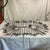 Offered is a 54 piece set of modernist Copenhagen Cutlery by Erik Herlow in the iconic "Obelisk" pattern. This...