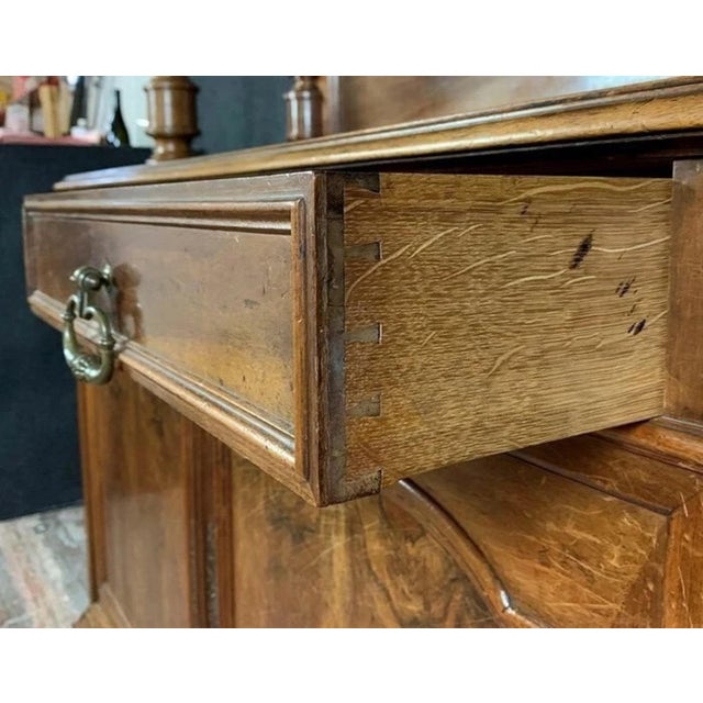 Superb Parisian Louis Philippe period walnut buffet/bookcase, circa 1830 Front opening with two drawers and four doors....