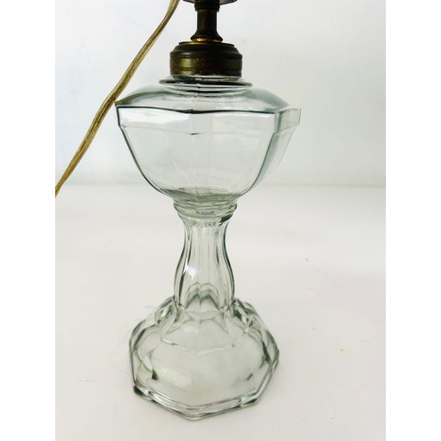 Vintage glass oil lamp converted to table lamp with Leviton company , this oil lamp from midcentury , in very good and...