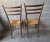 Pair of Gio Ponti designed Italian Walnut and Rush Seat Side Chairs in great vintage condition Measure 15.75" in width,...