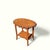 A vintage oval wood side table distinguished by a deeply scalloped molded edge, warm figured surface, gently curved legs,...