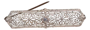 The Fedor: Antique Filigree Brooch in White Gold with an Old Mine Cut Diamond