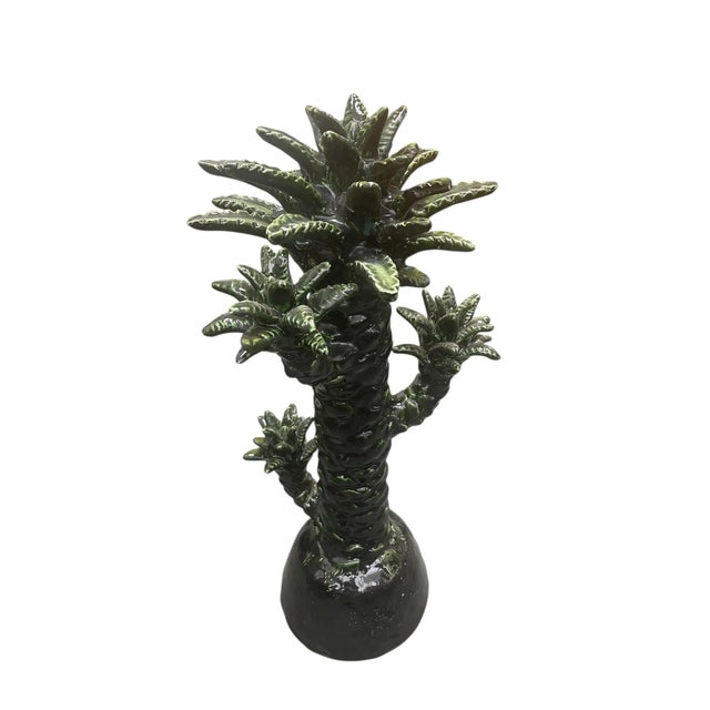 Bring a touch of exotic, lush charm to any space with this stunning, contemporary made Moroccan ceramic palm tree....
