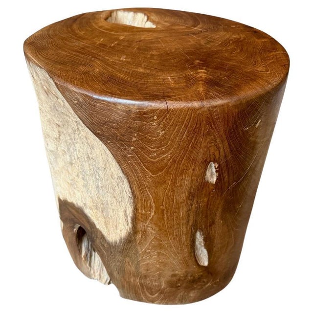 Reclaimed teak wood side table hand carved into this usable shape whilst respecting the natural organic wood. We polished...