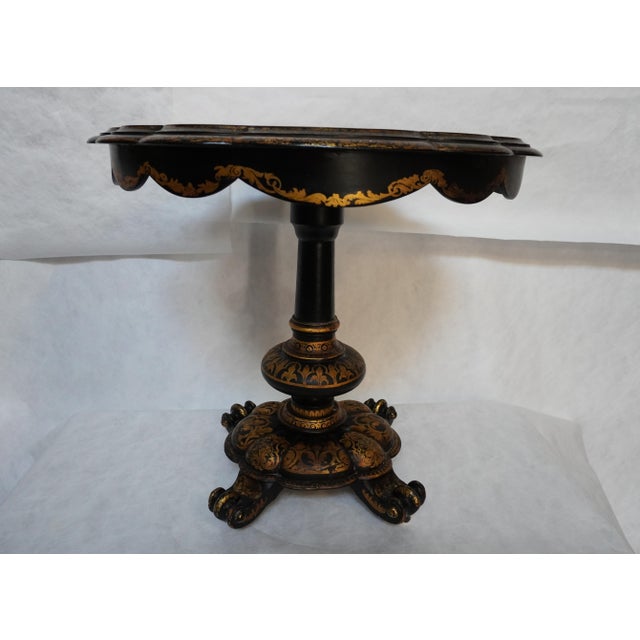 19th Century Victorian Papier / Paper Mache Tilt Top Table Incredible, hand-painted gold details and patterns around the...