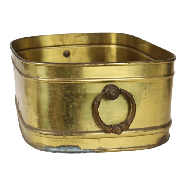 Large oval brass planter—an XL-sized jardinière or cache-pot—featuring sturdy, heavy brass handles; it can also serve as a...