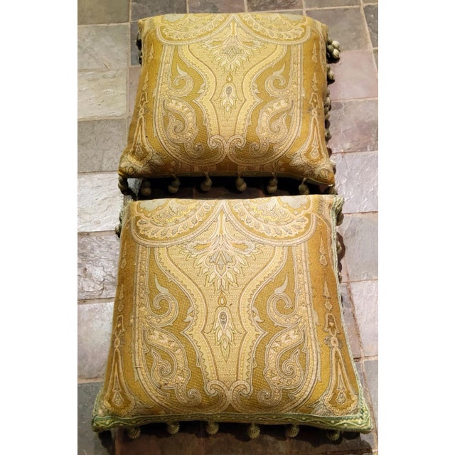 ANICHINI green brocade pillows measuring 20 x 20 and down filled are enhanced by fabulous tassles.