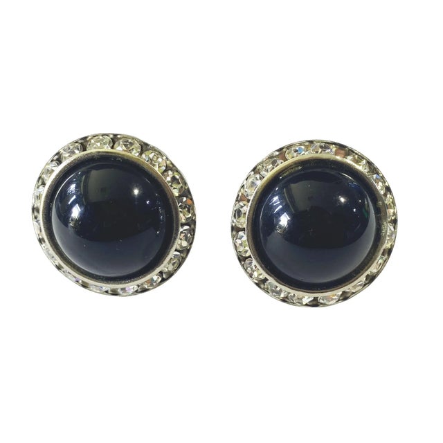 superb &nbsp;silver tone clip-on earrings from West Germany feature a vintage design with a faux round black stone and...
