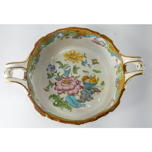 We are selling this aesthetic transferware English ironstone deep basin planter bowl by Cauldon. Handle is professionally...