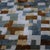 "Sophisticated yet playful, this handmade silk velvet pillow transforms geometric abstraction into a refined design...