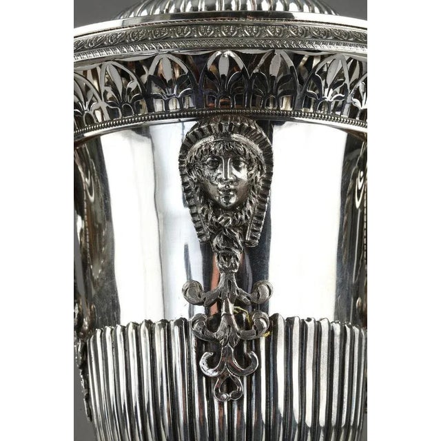 Early 19th century silver drageoir or candy dish adorned with Egyptian head and on the collar with openwork palmette...