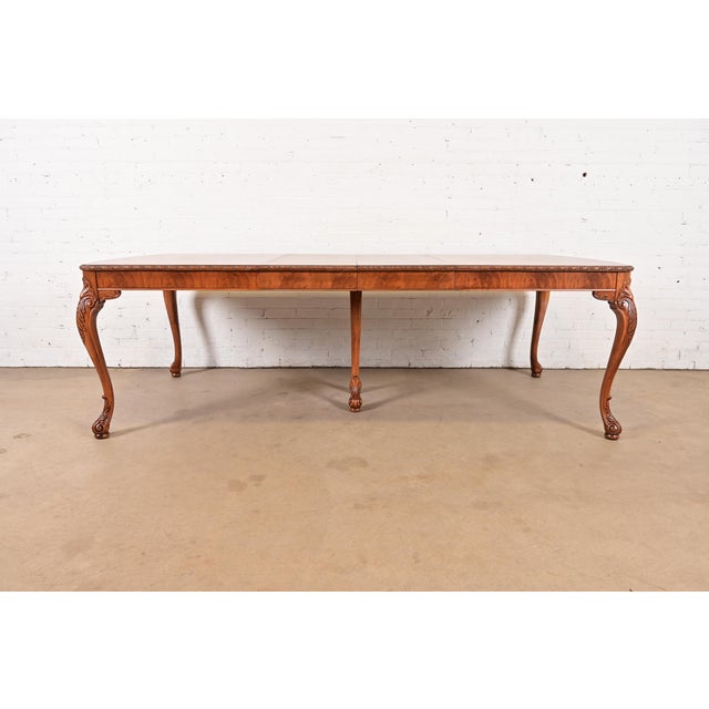 A gorgeous antique Chippendale or French Provincial Louis XV style extension dining table By Romweber USA, Circa 1920s...