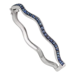 Versatile 4.75 Ct Blue Sapphire Channel Set Hinged Wave Bangle Bracelet by Carat&Her For Sale