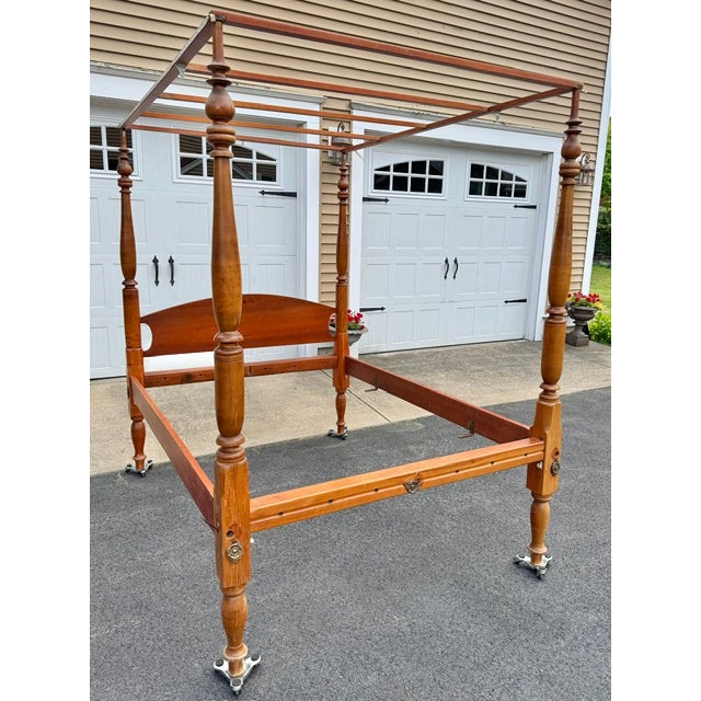 Antique early 19th century American canopy bed made of maple and pine. The headboard and the side rails are pine the rest...