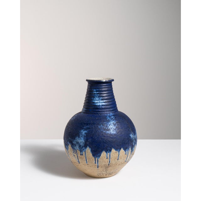 A jar in ceramic, hand-finished in the 20th century in Germany. The glaze and form reflect the artisanal ceramic...