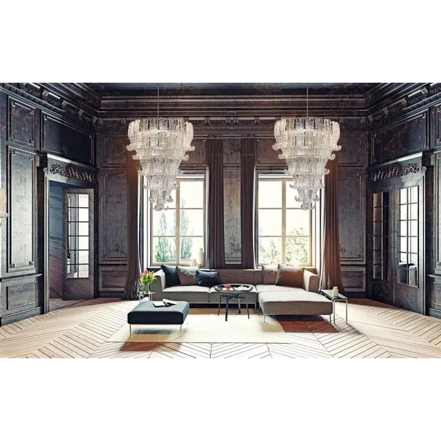 With 74 precious murano glass felci. 13-light bulbs E14. Measures: Height cm 105. With chain cm 170. Up to 250V (Europe/UK...