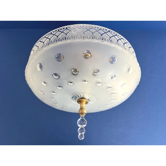 Petite 1940s acid etched and cut glass flush mount ceiling light in a translucent matte finish with chic inverted circles...