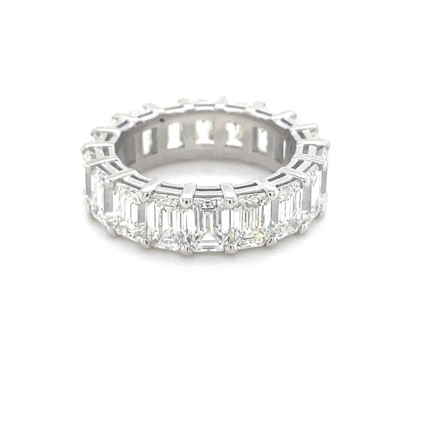 This amazing emerald cut eternity band contains 18 diamonds weighing 9.33 carats total. Mounted in platinum and...