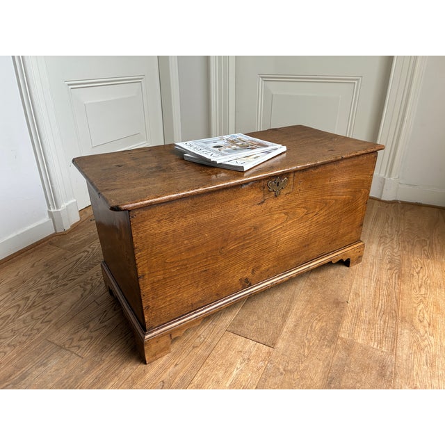 Beautiful large antique trunk/chest. Elm. Made around 1900, most likely in England. Quite a bit of wear and tear, and...