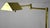 A pair of modernist brass floor lamps, circa 1970's/1980's. Lamps have reticulated swing arms and sport a halogen bulb....