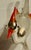 Wonderful antique mercury glass bird ornament with orange plumage and beak. Hand blown white body with silver head and...