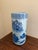 A gorgeous Chinoiserie blue and white porcelain umbrella or cane stand with Asian floral and landscape designs and birds...