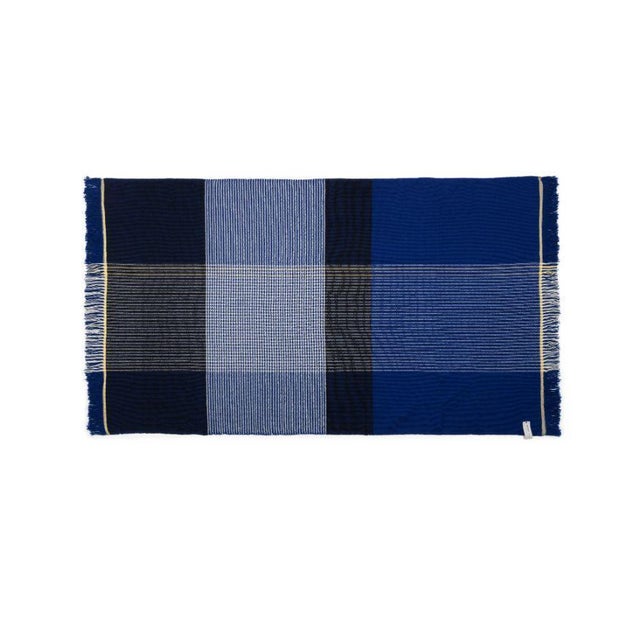 Blue Plaid Ruana by Sebastian Herkner Materials: 100% natural virgin wool. Technique: Hand-woven in Colombia. Dimensions:...