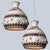 A pair of stunning round hanging lamps with an unusual shape, made with rich brown and beige striped ceramics,...