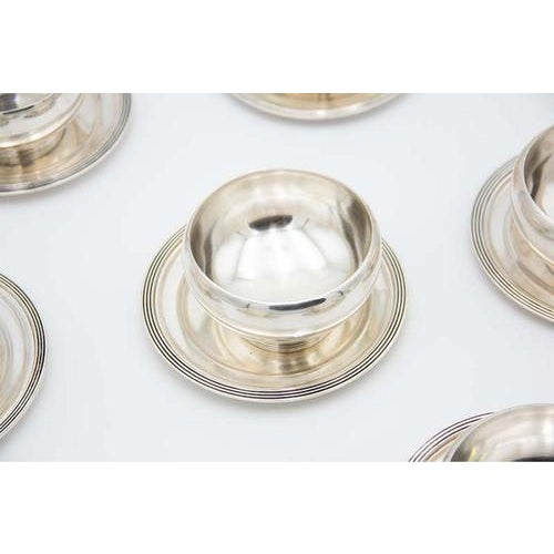 Washbasins in Plain Silver with Embossed Reliefs on the Bases, Set of 12, in Very Good conditions. Designed 1920 to 1949...