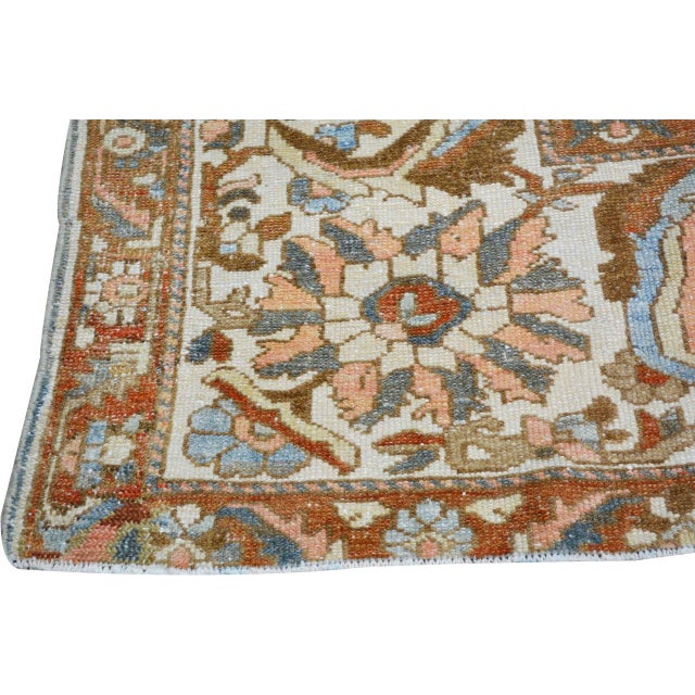 Hand-knotted with care using traditional rug-making techniques, this wool rug blends timeless craftsmanship with a modern...