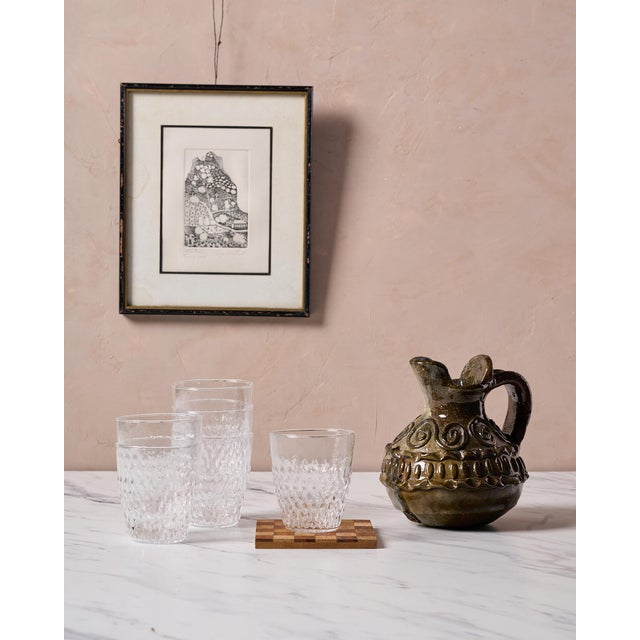 The Set of 6 Handblown "Pienza Rice Patterned" Drinking Glasses by Il Buco Vita is an artisan-crafted collection of...