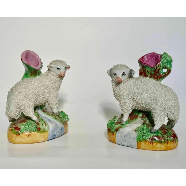 Pair of antique Staffordshire porcelain spill bud vases. Sheep and ram. Bottom markings:'Staffordshire Ware England'