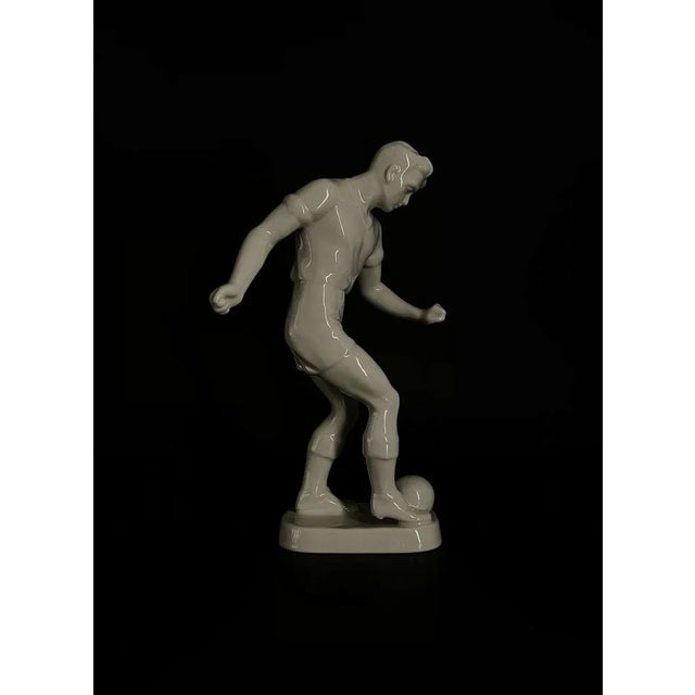 Hollóháza - antique football player porcelain figure, numbered on the base hungary, circa 1940 h: 27 - w: 13.5 - l: 11.5...