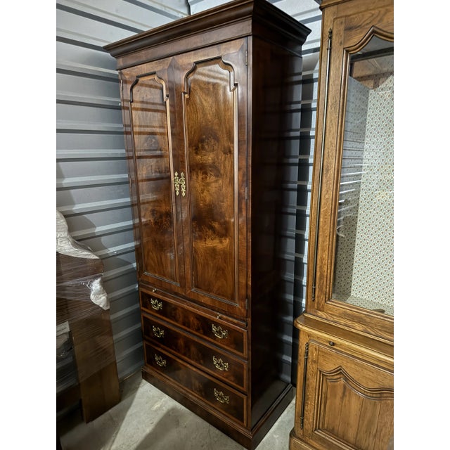 Dimensions: 36"w x 18"d x 82"h Henredon Armoire in excellent condition with ample and versatile storage. Items are part of...