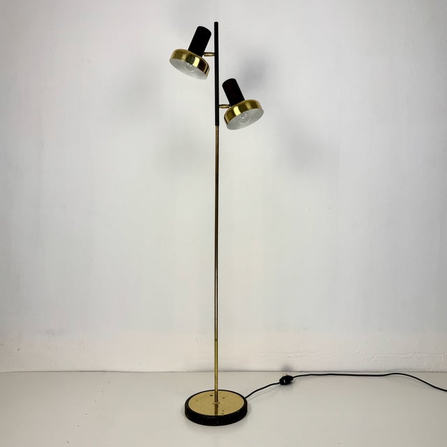Mid-Century Double Spotlight Floor Lamp in Brass, Germany, 1970s, in Good conditions. Designed 1970 to 1979 European Plug...
