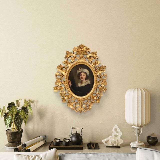 The Antique Paintings category presents a small oil on cardboard painting in an oval format depicting a female portrait,...
