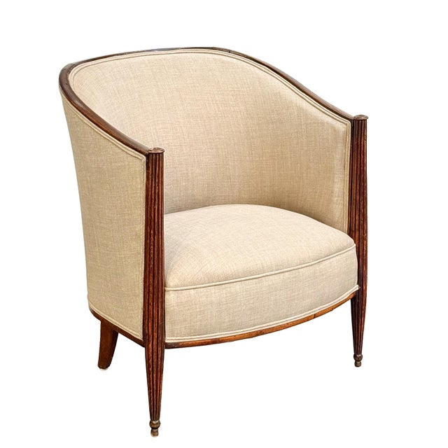 A beautiful pair of French lounge armchairs in the Art Deco style, created in the manner of iconic designer Paul Follot,...