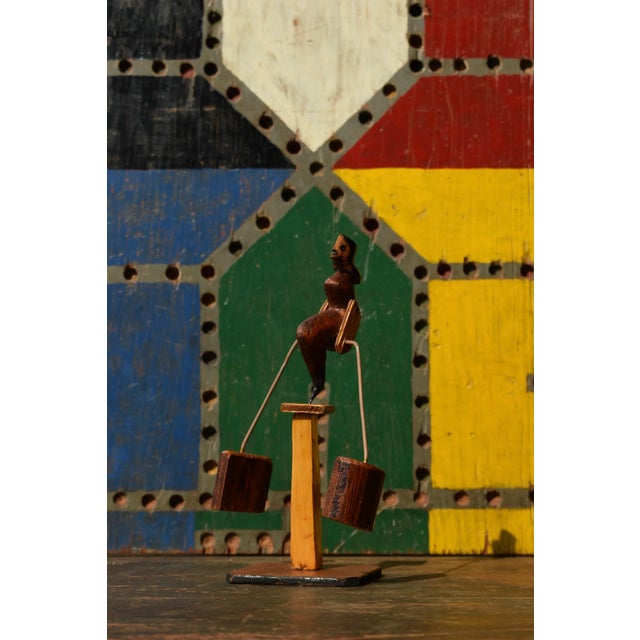 Vintage Folk Art Balancing Woman Kinetic Sculpture, Circa 1940s. This delightful kinetic sculpture is constructed from...