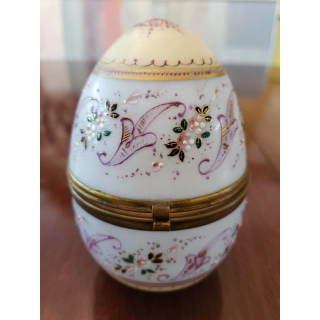 An original one hundred years old antique bohemian glass moser opaline egg jewelry box. Very much formed much like a...