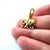 This authentic Cartier elephant charm pendant is crafted in solid 18k yellow gold and features a charming miniature...